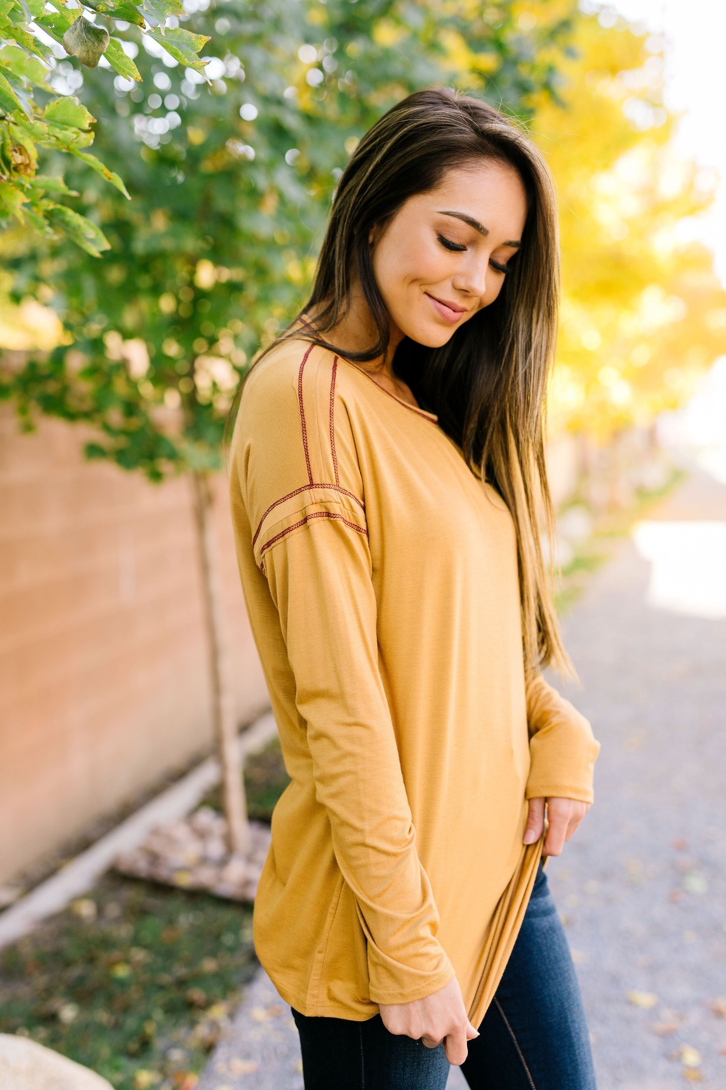 Beyond Compare Contrast Stitch Top In Mustard - ALL SALES FINAL