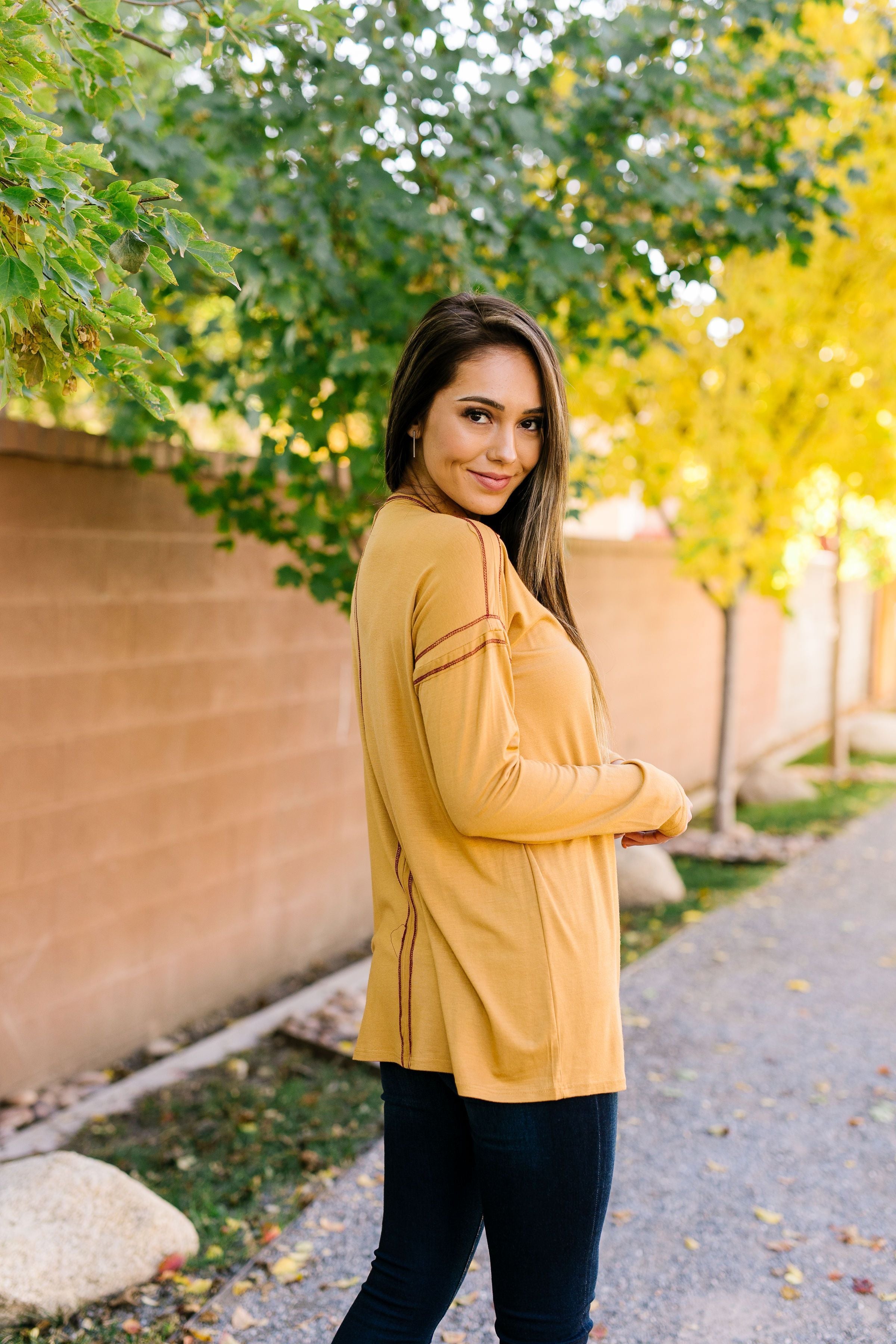 Beyond Compare Contrast Stitch Top In Mustard - ALL SALES FINAL