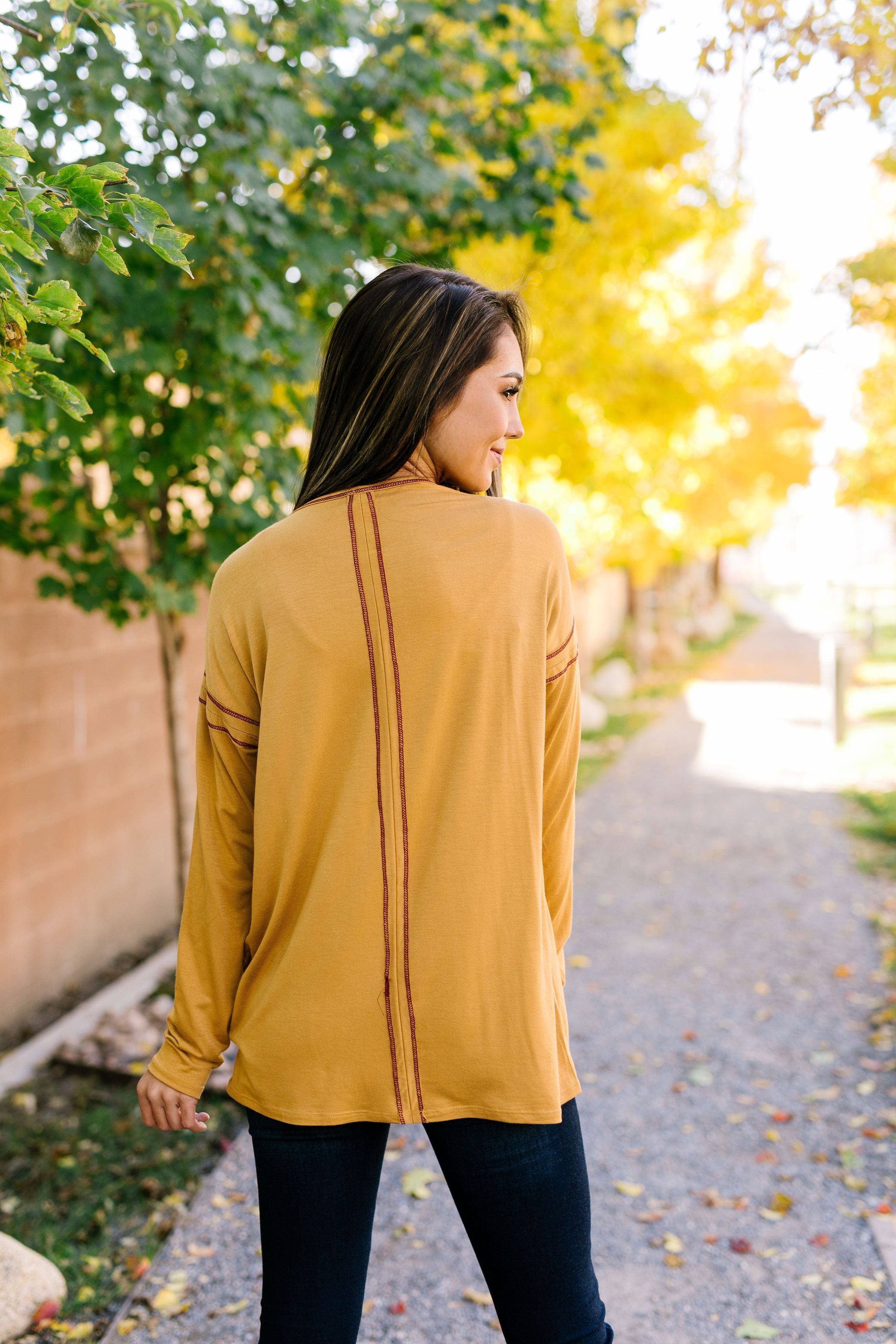 Beyond Compare Contrast Stitch Top In Mustard - ALL SALES FINAL