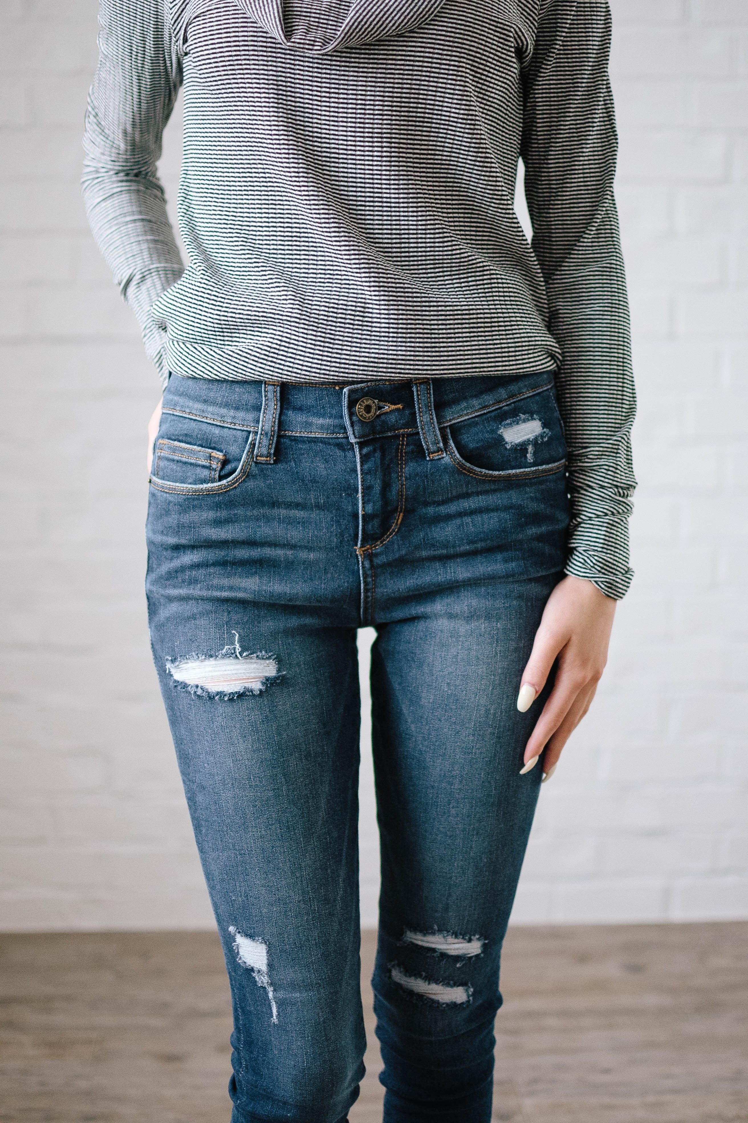 Distressed Mid Rise Skinny Jean