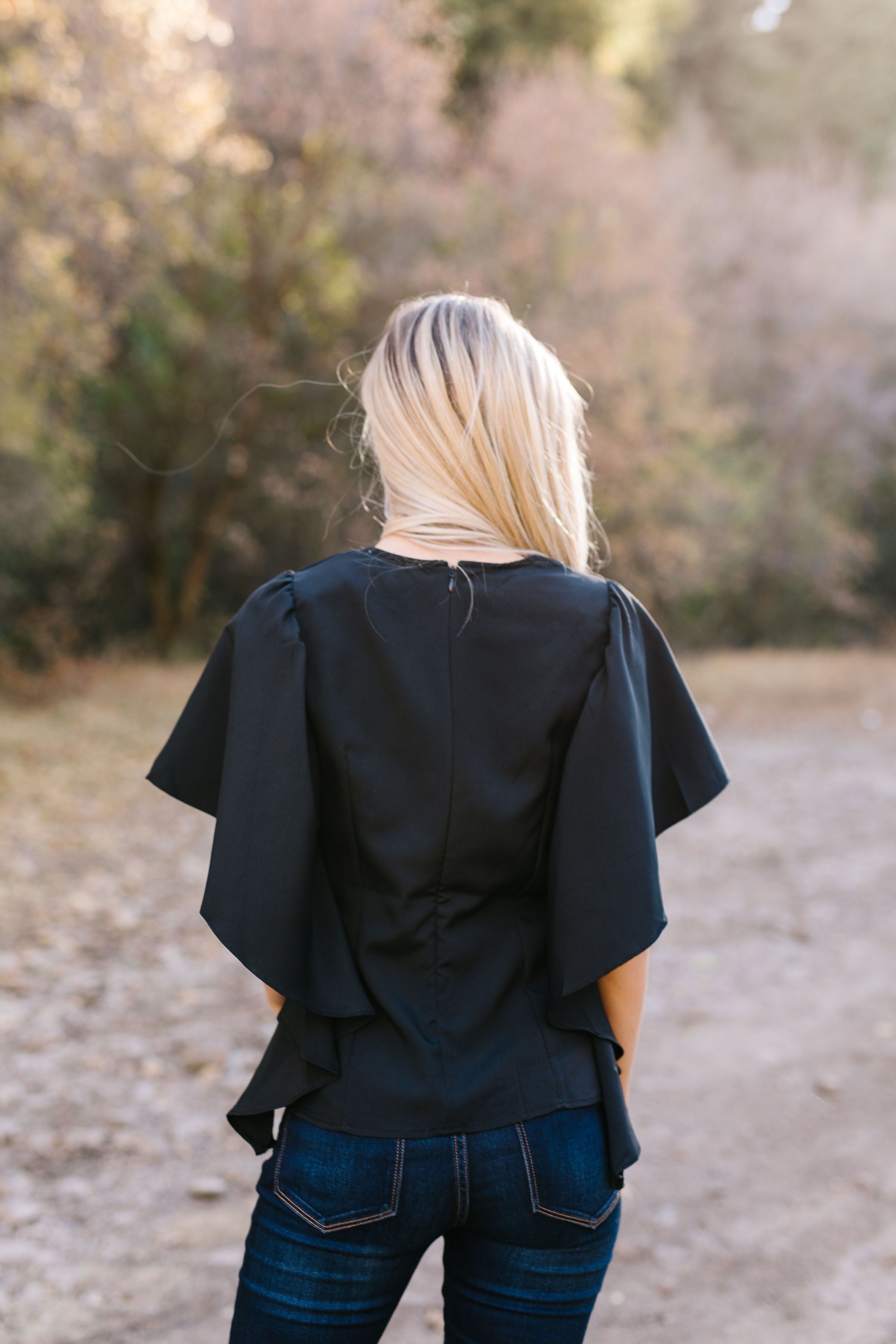 Wing And A Prayer Ruffle Sleeve Blouse in Black